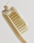texture of toothpaste on toothbrush
